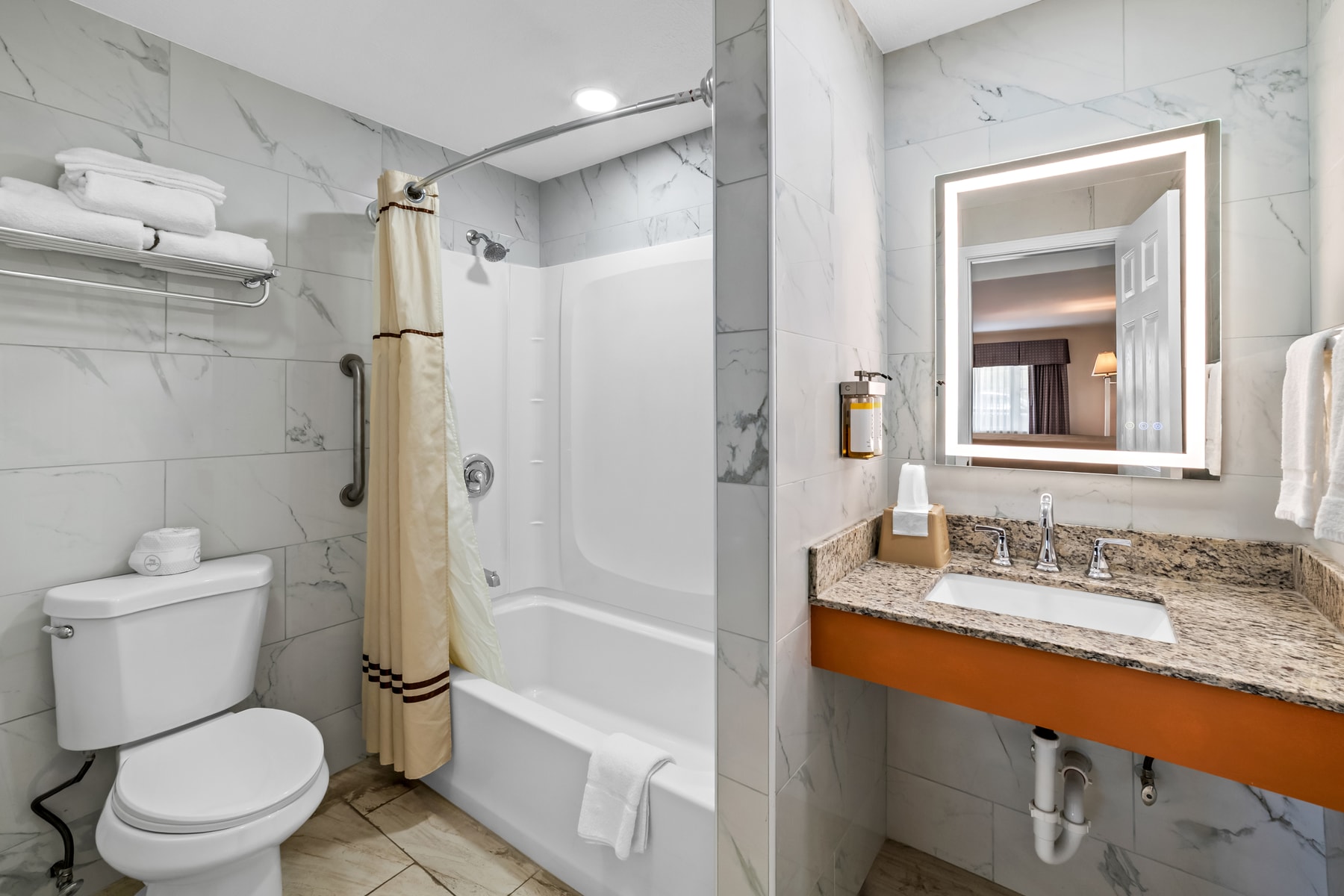 Bathtub and shower at Spring Water Inn